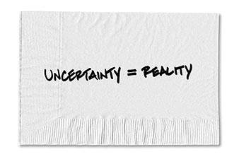 Paper napkin with uncertainty = reality written on it