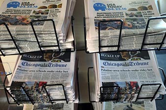 Newspapers for sale on a newsstand