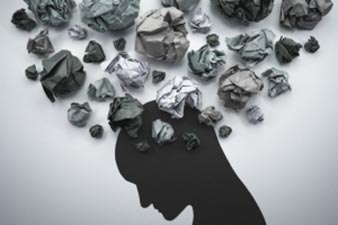 Illustration showing brain absorbing lots of bad news in the form of crumpled balls of grey paper