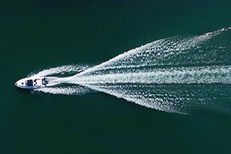 Speedboat with ever-expanding wake