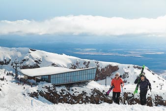 Couple enjoying a skiing holiday