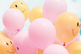 Balloons with smiley faces