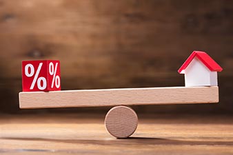 Seesaw with mortgage rate on one side, and your home on the other