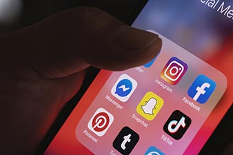 A mobile phone screen showing social media apps